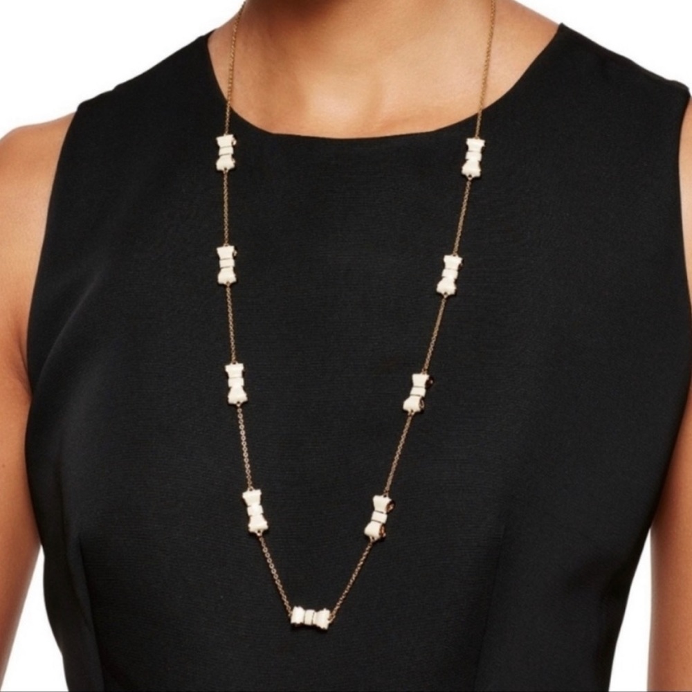 Kate Spade New York Take a Bow Gold and White Enamel Bow Station Chain Necklace